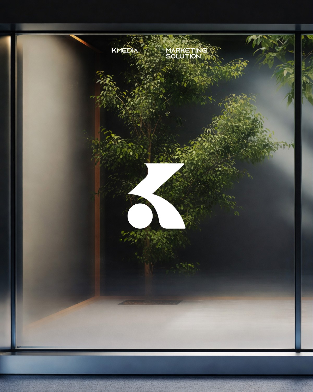 KMEDIA office entrance, glass signage